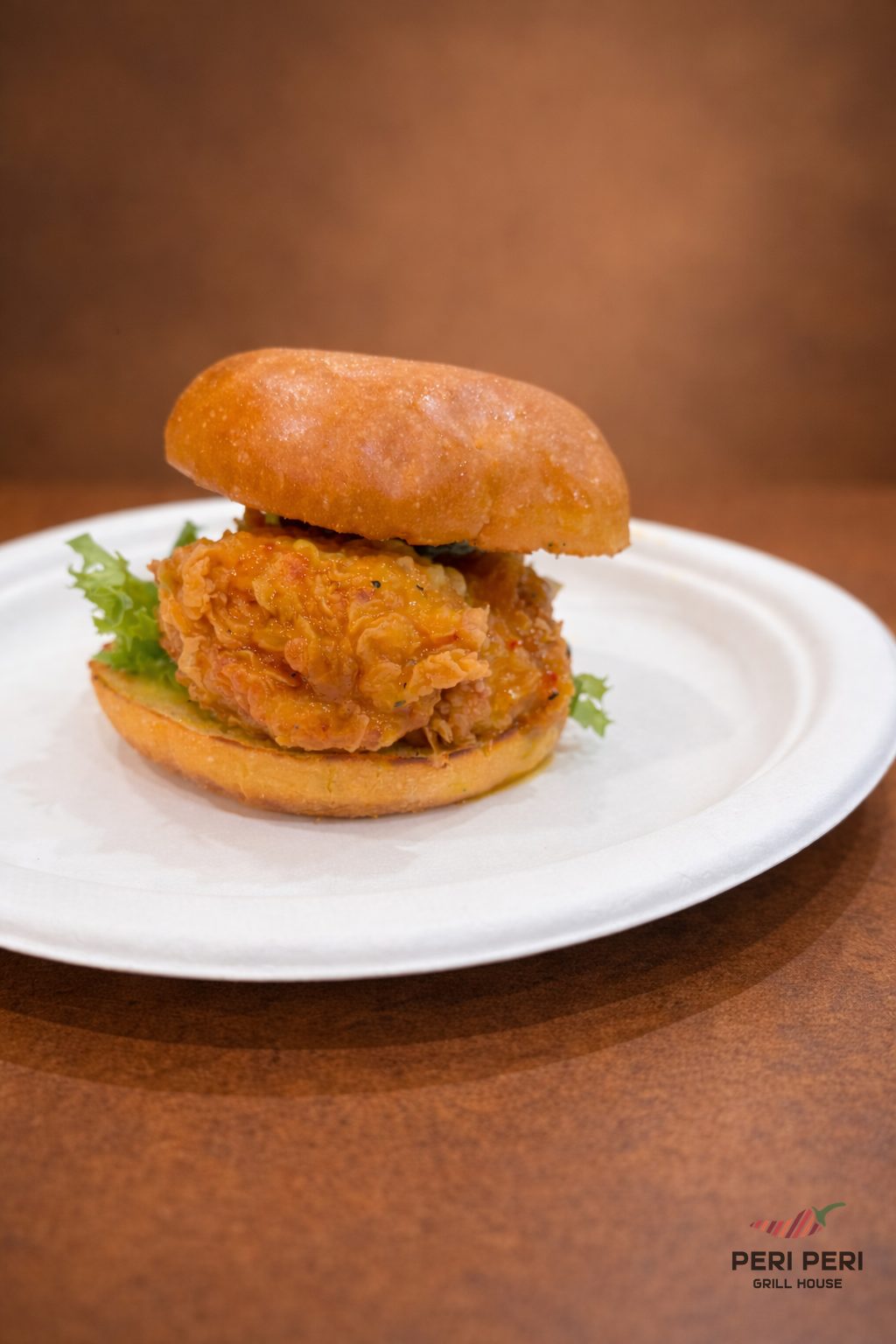 Halal crispy peri peri chicken sandwich at Peri Peri Grill House
